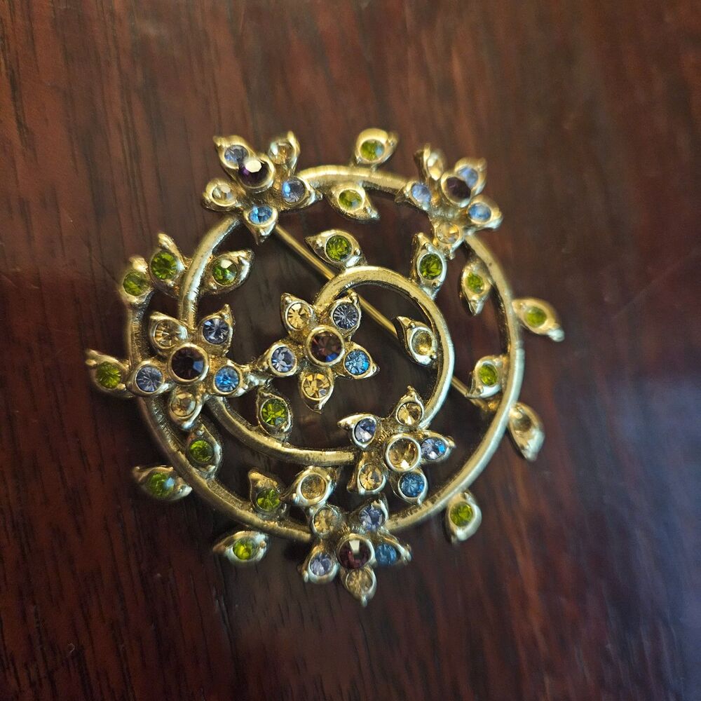 1967 Monet Signed Spring Spiral Floral Gold Plated Brooch with Rhinestones